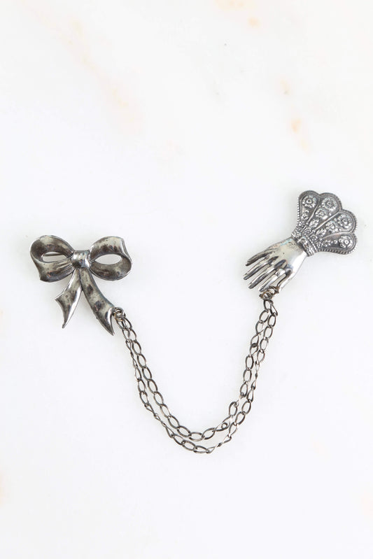 1930's Sterling Gauntlet and Bow Chain Brooch